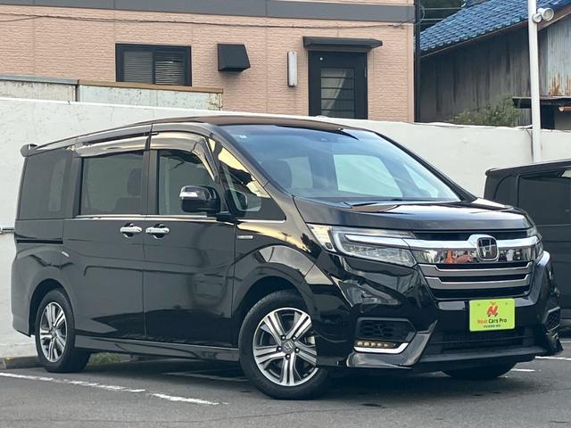 ステップワゴンスパーダ スパーダハイブリッド　Ｇ　ホンダセンシング　純正９インチナビ　バックカメラ　Ｂｌｕｅｔｏｏｔｈ　フルセグＴＶ　ＥＴＣ　両側パワースライドドア　禁煙車　ＬＥＤヘッドライト　クルーズコントロール（3枚目）