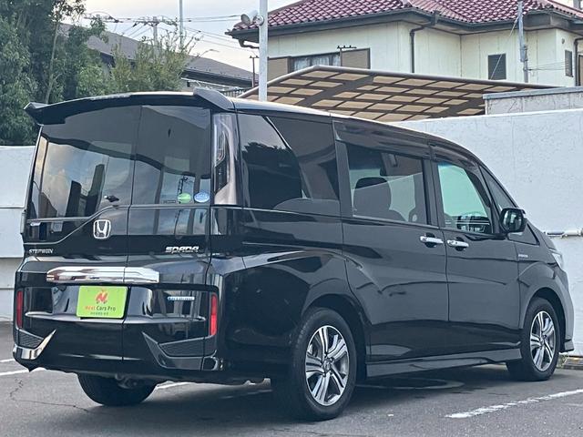ステップワゴンスパーダ スパーダハイブリッド　Ｇ　ホンダセンシング　純正９インチナビ　バックカメラ　Ｂｌｕｅｔｏｏｔｈ　フルセグＴＶ　ＥＴＣ　両側パワースライドドア　禁煙車　ＬＥＤヘッドライト　クルーズコントロール（7枚目）