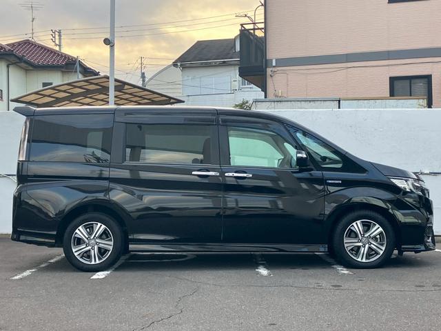 ステップワゴンスパーダ スパーダハイブリッド　Ｇ　ホンダセンシング　純正９インチナビ　バックカメラ　Ｂｌｕｅｔｏｏｔｈ　フルセグＴＶ　ＥＴＣ　両側パワースライドドア　禁煙車　ＬＥＤヘッドライト　クルーズコントロール（8枚目）