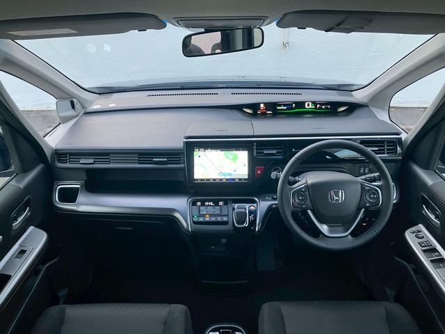 ステップワゴンスパーダ スパーダハイブリッド　Ｇ　ホンダセンシング　純正９インチナビ　バックカメラ　Ｂｌｕｅｔｏｏｔｈ　フルセグＴＶ　ＥＴＣ　両側パワースライドドア　禁煙車　ＬＥＤヘッドライト　クルーズコントロール（9枚目）
