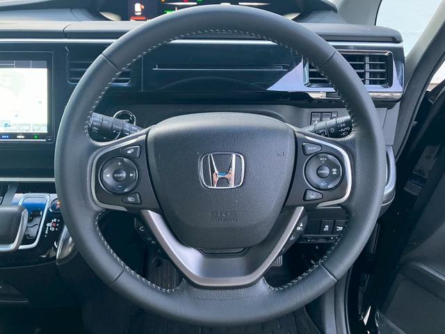 ステップワゴンスパーダ スパーダハイブリッド　Ｇ　ホンダセンシング　純正９インチナビ　バックカメラ　Ｂｌｕｅｔｏｏｔｈ　フルセグＴＶ　ＥＴＣ　両側パワースライドドア　禁煙車　ＬＥＤヘッドライト　クルーズコントロール（21枚目）