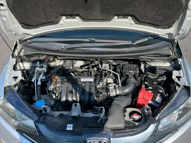 フィット １３Ｇ・Ｌパッケージ　純正ＳＤナビ　ＴＶ　バックカメラ　スマートキープッシュスタート　　ビルトインＥＴＣ　オートエアコン　Ｂｌｕｅｔｏｏｔｈ　ドアバイザー（27枚目）