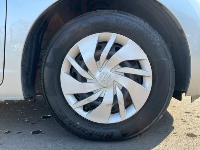 フィット １３Ｇ・Ｌパッケージ　純正ＳＤナビ　ＴＶ　バックカメラ　スマートキープッシュスタート　　ビルトインＥＴＣ　オートエアコン　Ｂｌｕｅｔｏｏｔｈ　ドアバイザー（31枚目）