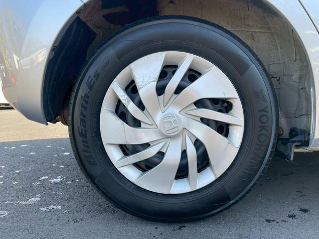 フィット １３Ｇ・Ｌパッケージ　純正ＳＤナビ　ＴＶ　バックカメラ　スマートキープッシュスタート　　ビルトインＥＴＣ　オートエアコン　Ｂｌｕｅｔｏｏｔｈ　ドアバイザー（32枚目）