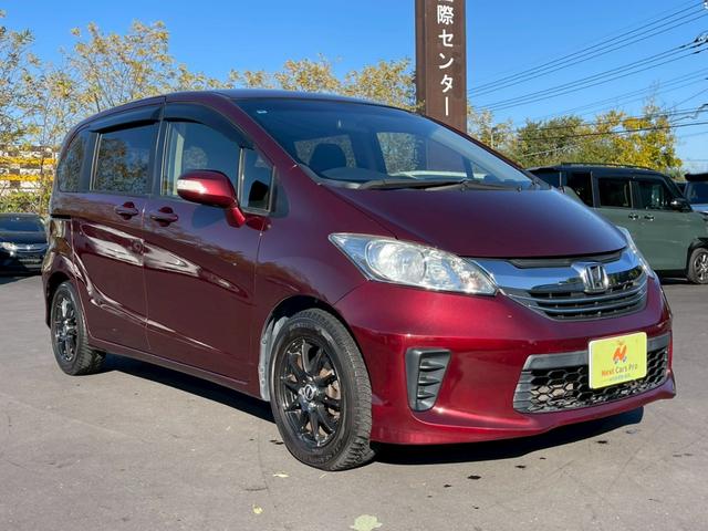 フリード Ｇ　ジャストセレクション　両側パワースライドドア　社外ナビ　フルセグ　バックモニター　スマートキー　ＨＩＤヘッドライト　ＥＴＣ（7枚目）