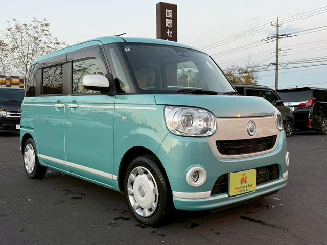 ムーヴキャンバス Ｇホワイトアクセントリミテッド　ＳＡＩＩＩ　純正ナビ　フルセグ　全周囲モニター　両側パワースライドドア　衝突回避支援ブレーキ　車線逸脱　前後方誤発進抑制　ＬＥＤヘッドライト　シートカバー　スマートキー　プッシュスタート　ワンオーナー（2枚目）