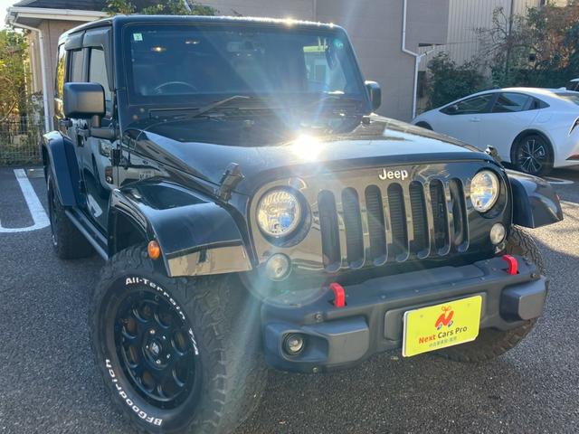 ジープ・ラングラーアンリミテッド サハラ　社外ナビ　バックカメラ　ＥＴＣ　黒革シート　ＪＡＯＳ　ＢＡＴＴＬＥＺマフラー　ルビコンバンパー　メーカーオプションサイドスッテプ　シートヒーター　ＸＳＴＲＥＡＭ１アルミ　ワンオーナー（5枚目）