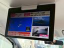 Ｘ　純正ナビ　純正フリップダウンモニター　両側電動スライドドア　バックモニター　フルセグＴＶ　オートエアコン　ビルトインＥＴＣ　スマートキー　取扱説明書　記録簿　リアエアコン　Ｂｌｕｅｔｏｏｔｈ（21枚目）