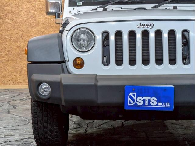 ジープ・ラングラーアンリミテッド スポーツ 社外ナビ フルセグTV Bluetooth バックカメラ 17インチAW・A/Tタイヤ サイドステップ 背面タイヤ フォグランプ ステアスイッチ オートクルーズ リモコンキー スペアキー ETC車載器(10枚目)
