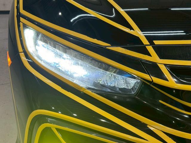 シビック ハッチバック ホンダセンシング イエローエッヂライン HKSマフラー 社外テールランプ 純正ナビ フルセグTV バックカメラ アームレストカーボン調 シートカバー シートヒーター ステアスイッチ レーダー探知機 スマートキー ETC(10枚目)