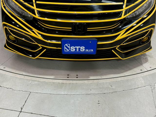 シビック ハッチバック ホンダセンシング イエローエッヂライン HKSマフラー 社外テールランプ 純正ナビ フルセグTV バックカメラ アームレストカーボン調 シートカバー シートヒーター ステアスイッチ レーダー探知機 スマートキー ETC(22枚目)