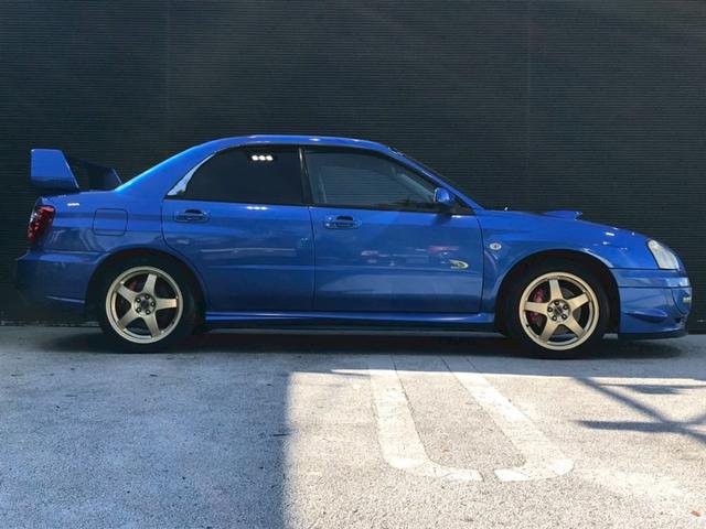 インプレッサ WRX 2004 Vリミテッド STIフロントスポイラー・マフラー 大型リアスポイラー ボンネットダクト 社外HDDナビ HIDヘッドライト 17インチアルミ ステアスイッチ 4WD・ターボ M/Tモード リモコンキー ETC車載器(10枚目)