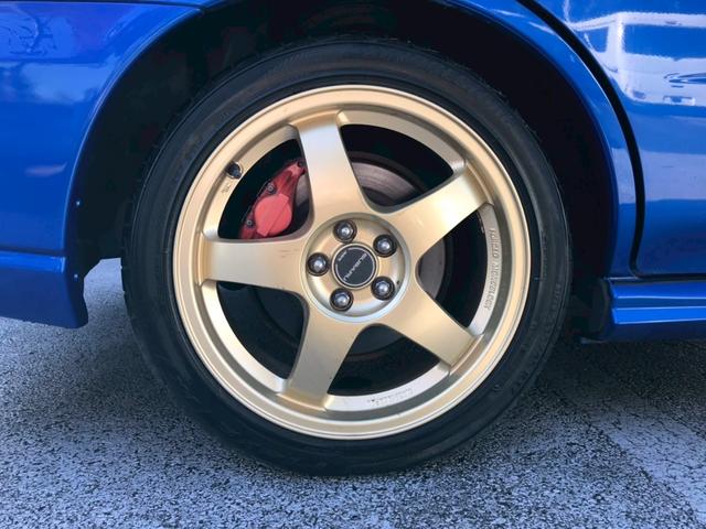 インプレッサ WRX 2004 Vリミテッド STIフロントスポイラー・マフラー 大型リアスポイラー ボンネットダクト 社外HDDナビ HIDヘッドライト 17インチアルミ ステアスイッチ 4WD・ターボ M/Tモード リモコンキー ETC車載器(61枚目)