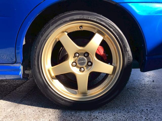 インプレッサ WRX 2004 Vリミテッド STIフロントスポイラー・マフラー 大型リアスポイラー ボンネットダクト 社外HDDナビ HIDヘッドライト 17インチアルミ ステアスイッチ 4WD・ターボ M/Tモード リモコンキー ETC車載器(62枚目)
