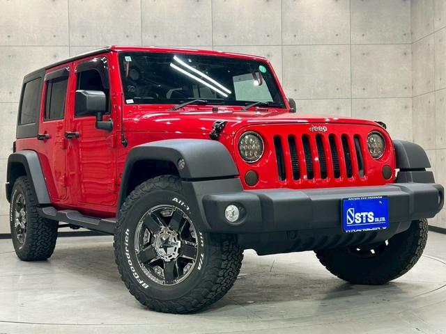 ジープ・ラングラーアンリミテッド スポーツ 社外マフラー 社外ヘッドライト・テール 社外フードキャッチ・グラブハンドル 社外クロームフェールカバー 17インチロックスターホイール インテリアクロムパーツ 社外ナビ DTV BT接続 バックカメラ(15枚目)