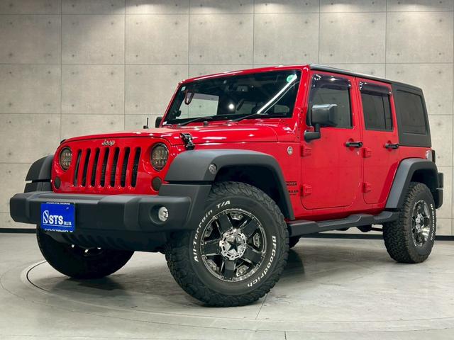 ジープ・ラングラーアンリミテッド スポーツ 社外マフラー 社外ヘッドライト・テール 社外フードキャッチ・グラブハンドル 社外クロームフェールカバー 17インチロックスターホイール インテリアクロムパーツ 社外ナビ DTV BT接続 バックカメラ(26枚目)