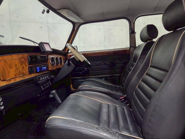 MINI クーパー 社外12インチアルミホイール ブラックレザーシート ポータブルナビ カロッツェリアオーディオ エアコン 木目インパネ 革巻きステアリング ETC車載器 実走行5.3万キロ台 正規ディーラー 色替え車両(42枚目)