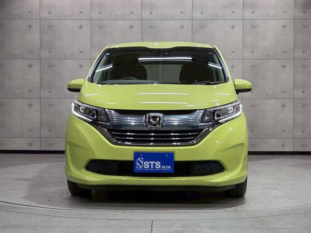 フリードハイブリッド ハイブリッド・ＥＸ　純正ナビ　フルセグＴＶ　Ｂｌｕｅｔｏｏｔｈ　バックカメラ　フリップダウン　ＬＥＤヘッドライト　両側パワスラ　純正１５インチＡＷ　ハーフレザーシート　シートヒーター　レーダークルーズ　スペアキー　ＥＴＣ（8枚目）