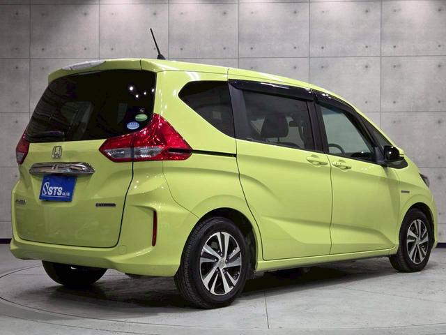 フリードハイブリッド ハイブリッド・ＥＸ　純正ナビ　フルセグＴＶ　Ｂｌｕｅｔｏｏｔｈ　バックカメラ　フリップダウン　ＬＥＤヘッドライト　両側パワスラ　純正１５インチＡＷ　ハーフレザーシート　シートヒーター　レーダークルーズ　スペアキー　ＥＴＣ（14枚目）