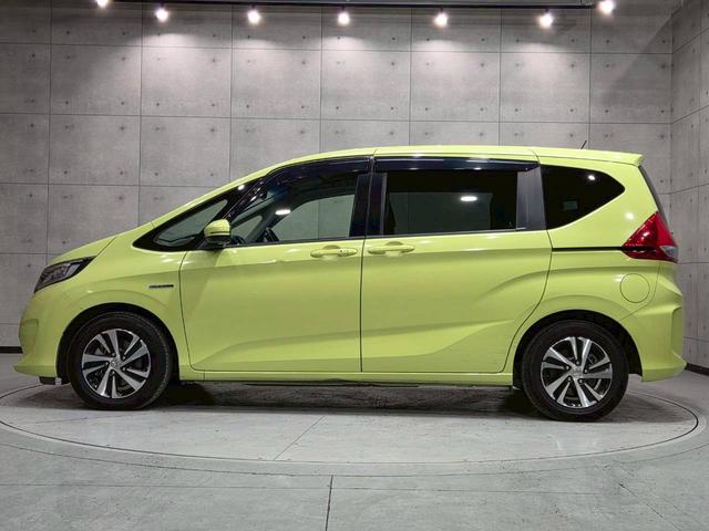 フリードハイブリッド ハイブリッド・ＥＸ　純正ナビ　フルセグＴＶ　Ｂｌｕｅｔｏｏｔｈ　バックカメラ　フリップダウン　ＬＥＤヘッドライト　両側パワスラ　純正１５インチＡＷ　ハーフレザーシート　シートヒーター　レーダークルーズ　スペアキー　ＥＴＣ（20枚目）