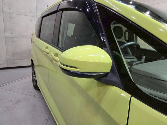 フリードハイブリッド ハイブリッド・ＥＸ　純正ナビ　フルセグＴＶ　Ｂｌｕｅｔｏｏｔｈ　バックカメラ　フリップダウン　ＬＥＤヘッドライト　両側パワスラ　純正１５インチＡＷ　ハーフレザーシート　シートヒーター　レーダークルーズ　スペアキー　ＥＴＣ（22枚目）