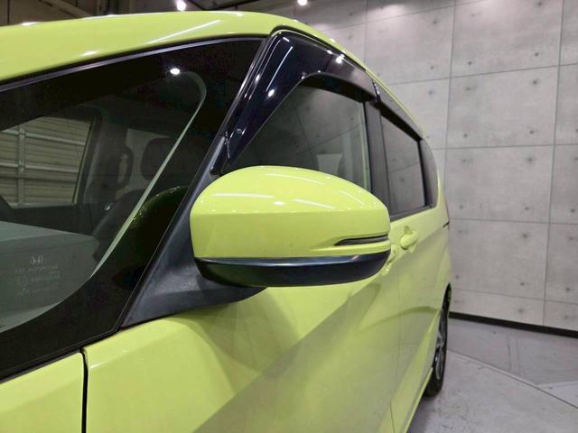 フリードハイブリッド ハイブリッド・ＥＸ　純正ナビ　フルセグＴＶ　Ｂｌｕｅｔｏｏｔｈ　バックカメラ　フリップダウン　ＬＥＤヘッドライト　両側パワスラ　純正１５インチＡＷ　ハーフレザーシート　シートヒーター　レーダークルーズ　スペアキー　ＥＴＣ（23枚目）