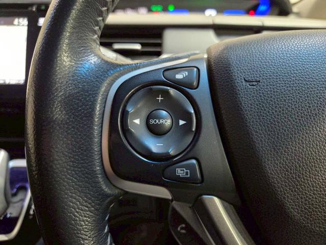 フリードハイブリッド ハイブリッド・ＥＸ　純正ナビ　フルセグＴＶ　Ｂｌｕｅｔｏｏｔｈ　バックカメラ　フリップダウン　ＬＥＤヘッドライト　両側パワスラ　純正１５インチＡＷ　ハーフレザーシート　シートヒーター　レーダークルーズ　スペアキー　ＥＴＣ（30枚目）