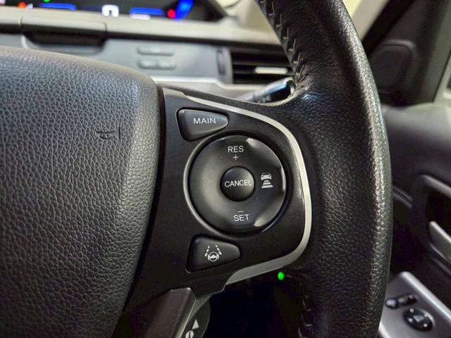 フリードハイブリッド ハイブリッド・ＥＸ　純正ナビ　フルセグＴＶ　Ｂｌｕｅｔｏｏｔｈ　バックカメラ　フリップダウン　ＬＥＤヘッドライト　両側パワスラ　純正１５インチＡＷ　ハーフレザーシート　シートヒーター　レーダークルーズ　スペアキー　ＥＴＣ（31枚目）