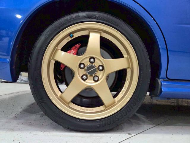 インプレッサ ＷＲＸ　ＷＲ－リミテッド　２００５　屋内車庫・カバー保管／ユーザー様直接仕入れ／ＳＴｉゲノムターボ計／ＳＴｉゲノムマフラー／ＳＴｉフロントリップ／スバル純正ＲＡＹＳ１７インチＡＷ／リアウイング／ＨＩＤヘッドライト／社外ナビ／リモコンキー（62枚目）