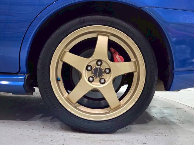 インプレッサ ＷＲＸ　ＷＲ－リミテッド　２００５　屋内車庫・カバー保管／ユーザー様直接仕入れ／ＳＴｉゲノムターボ計／ＳＴｉゲノムマフラー／ＳＴｉフロントリップ／スバル純正ＲＡＹＳ１７インチＡＷ／リアウイング／ＨＩＤヘッドライト／社外ナビ／リモコンキー（64枚目）