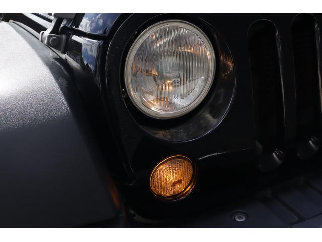 ジープ・ラングラーアンリミテッド スポーツ　当店買取車両　クルコン　社外ナビ　地デジ　ＢＴ　ＣＤ／ＤＶＤ　Ｂカメラ　サイドカメラ　ステアＳ　ＬＥＤライト　Ｆ／Ｒフォグ　純正１８インチＡＷ　純正フロアマット　ＥＴＣ　リモコンキー　スペアキー１本（61枚目）