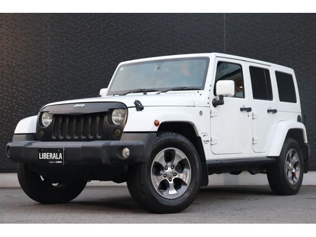 ジープ・ラングラーアンリミテッド サハラ　当店買取車両　社外グリル　Ｓステップ　ＡＬＰＩＮＥサウンド　クルコン　社外ナビ　地デジ　ＢＴ　Ｂカメラ　Ｓカメラ　茶本革　シートＨ　社外ＬＥＤライト　Ａライト　Ｆ／Ｒフォグ　純正１８インチＡＷ　ＥＴＣ（15枚目）