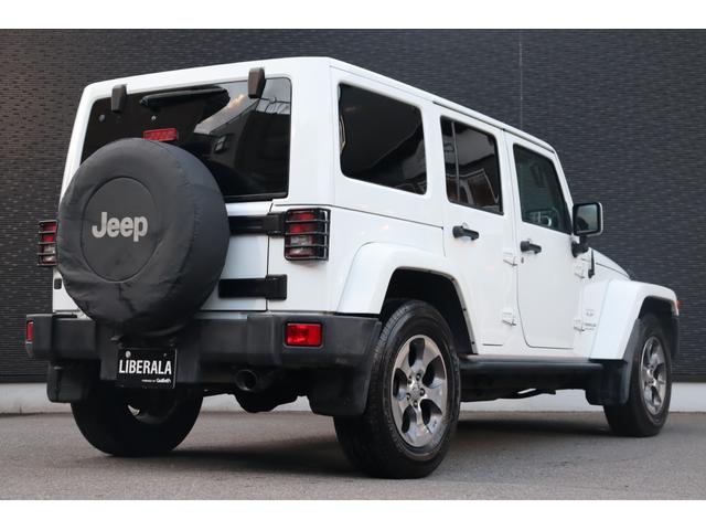 ジープ・ラングラーアンリミテッド サハラ　当店買取車両　社外グリル　Ｓステップ　ＡＬＰＩＮＥサウンド　クルコン　社外ナビ　地デジ　ＢＴ　Ｂカメラ　Ｓカメラ　茶本革　シートＨ　社外ＬＥＤライト　Ａライト　Ｆ／Ｒフォグ　純正１８インチＡＷ　ＥＴＣ（16枚目）
