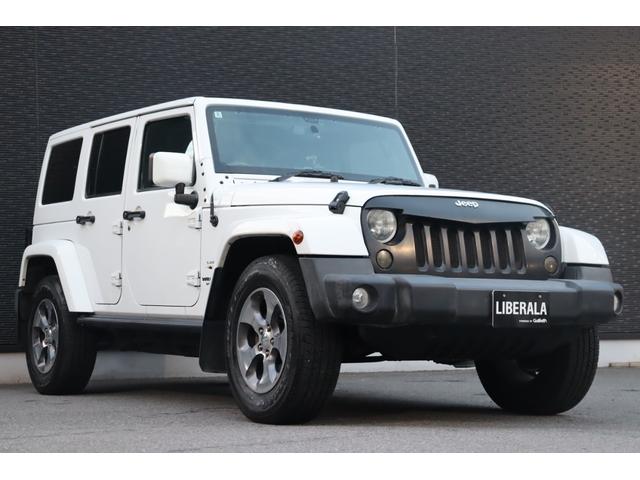 ジープ・ラングラーアンリミテッド サハラ　当店買取車両　社外グリル　Ｓステップ　ＡＬＰＩＮＥサウンド　クルコン　社外ナビ　地デジ　ＢＴ　Ｂカメラ　Ｓカメラ　茶本革　シートＨ　社外ＬＥＤライト　Ａライト　Ｆ／Ｒフォグ　純正１８インチＡＷ　ＥＴＣ（17枚目）