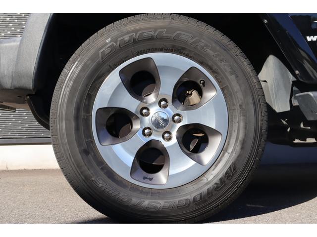 ジープ・ラングラーアンリミテッド サハラ 当店買取車両 クルコン 社外ナビ 地デジ BT アルパインサウンド Bカメラ 社外LEDヘッドライト Aライト F/Rフォグ ステアS サイドステップ 純正18インチAW 社外ドラレコ前後 ETC(23枚目)