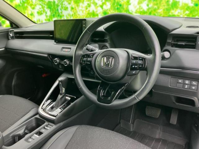 ヴェゼル ｅＨＥＶ　Ｚ　保証書／純正　９インチ　ＳＤナビ／衝突安全装置／シートヒーター／車線逸脱防止支援システム／シート　ハーフレザー／電動バックドア／ヘッドランプ　ＬＥＤ／ＥＴＣ／ＥＢＤ付ＡＢＳ／横滑り防止装置（4枚目）