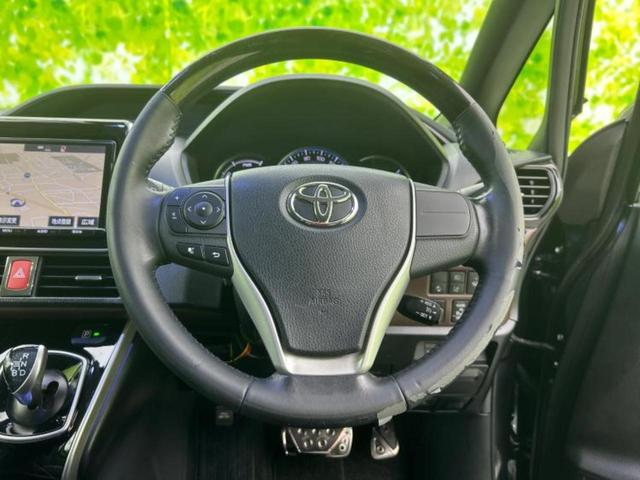 エスクァイア ハイブリッドGi 純正エアロ/純正 9インチ SDナビ/フリップダウンモニター 純正 12.8インチ/両側電動スライドドア/シートヒーター/シート 合皮/パーキングアシスト バックガイド フルエアロ 後席モニター(16枚目)