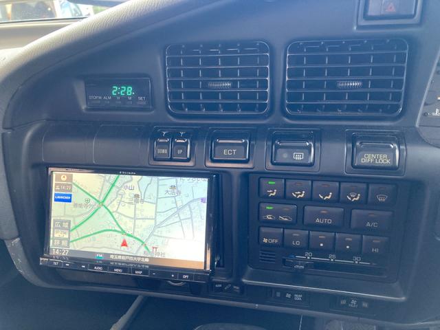 ランドクルーザー８０ ＶＸリミテッド　４ＷＤ　ＥＴＣ　バックカメラ　オートクルーズコントロール　サンルーフ　ナビ　ＴＶ　オートライト　ヘッドライトウォッシャー　アルミホイール　ＡＴ　ＣＤ　ＵＳＢ　Ｂｌｕｅｔｏｏｔｈ（66枚目）