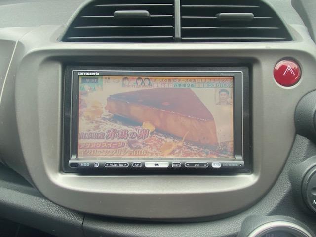 フィット Ｌ　Ｆパッケージ　社外ナビゲーション　地デジテレビ　ＥＴＣ　社外アルミホイール　ＡＢＳ　エアバック（23枚目）