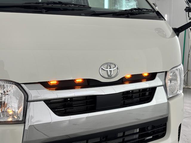 ハイエースバン ロングDX GLパッケージ アルパイン ALPINE BIG-X 11インチナビ IPF フロントグリルマーカー ホワイトレタータイヤ EAGLE #1 NASCAR MID×DODコラボホイール ウシャリン(15枚目)