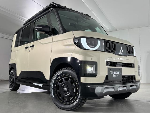 デリカミニ Ｔ　プレミアム　デリマルパッケージ　登録済み未使用車早速カスタム！　オートフラッグス　ルーフラック　ＢＵＳＴＥＲＳｍｉｎｉ装着　ＸＪ０８　１５インチアルミホイール　ＯＰＥＮ　ＣＯＵＮＴＲＹ　Ｒ／Ｔ（14枚目）