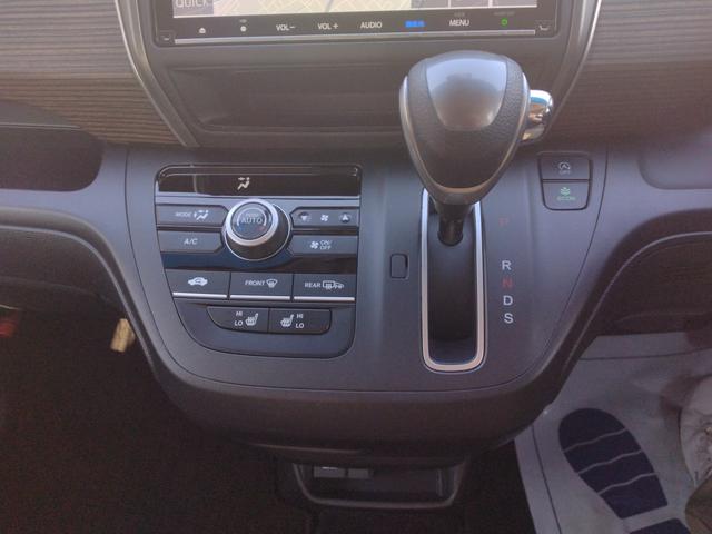 フリード クロスター・ホンダセンシング 12ヶ月距離無制限保証 フリップダウンモニター 前後ドライブレコーダー フルセグTV Bluetooth接続 両側パワースライドドア USB入力端子 クルーズコントロール バックカメラ ETC(28枚目)