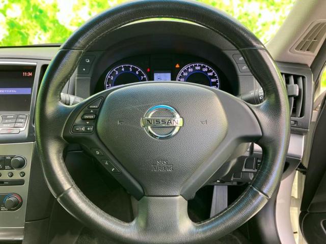 スカイライン ３７０ＧＴ　純正　ＨＤＤナビ／シート　合皮／ＥＴＣ／横滑り防止装置／バックモニター／エアバッグ　運転席／エアバッグ　助手席／ＭＴモード付き／アルミホイール　社外　１９インチ／パワーウインドウ　バックカメラ（13枚目）