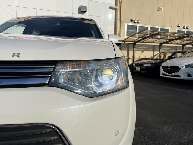 アウトランダーＰＨＥＶ Ｇプレミアムパッケージ☆４ＷＤ☆走行１．６万☆試乗できます☆　☆４ＷＤ☆ナビ☆Ｂｌｕｅｔｏｏｔｈ☆サイド／バックカメラ☆フリップダウンモニター☆レーダークルーズ☆衝突軽減ブレーキ☆キセノン＋オートライト☆前席シートヒーター☆黒革シート☆走行１．６万☆試乗ＯＫ☆（46枚目）