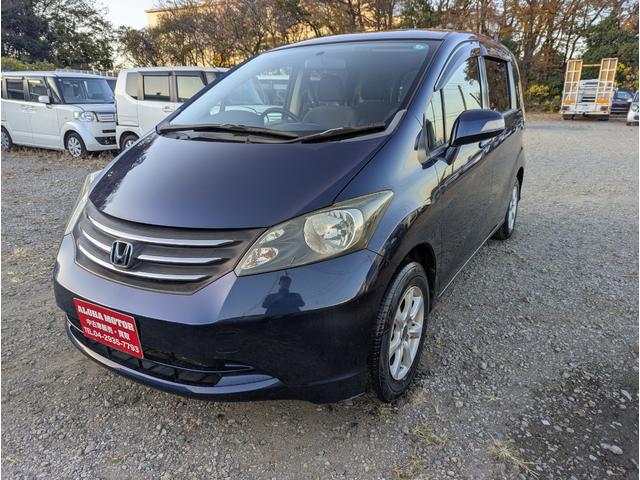 フリード Ｇ　Ｌパッケージ　禁煙車　バックカメラ　ナビ　テレビ　左側パワースライドドア　アルミホイール　キーレスエントリー　ＨＩＤ　ＥＴＣ　ＤＶＤ　ＡＢＳ（3枚目）