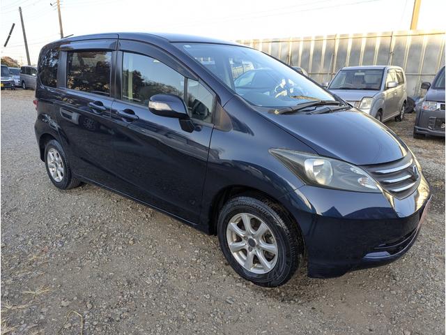 フリード Ｇ　Ｌパッケージ　禁煙車　バックカメラ　ナビ　テレビ　左側パワースライドドア　アルミホイール　キーレスエントリー　ＨＩＤ　ＥＴＣ　ＤＶＤ　ＡＢＳ（6枚目）