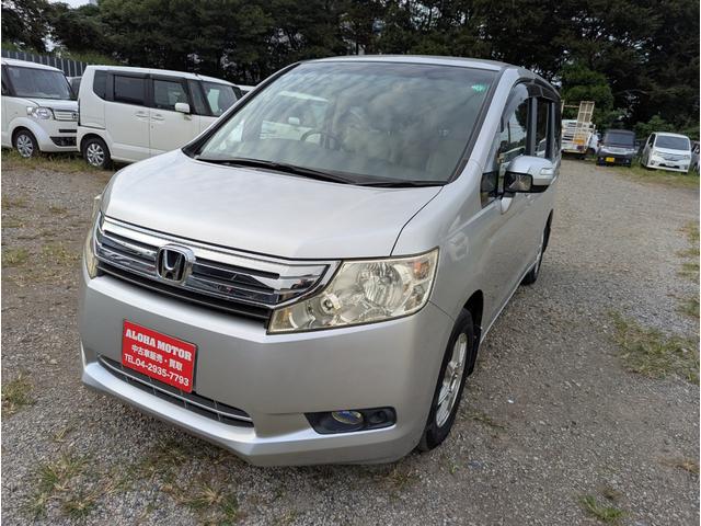 ステップワゴン Ｌ　４ＷＤ　禁煙車　バックカメラ　スマートキー　両側パワースライドドア　ナビ　テレビ　アルミホイール　ＥＴＣ　ＨＩＤ　ＡＢＳ　ドライブレコーダー　オートライト（3枚目）