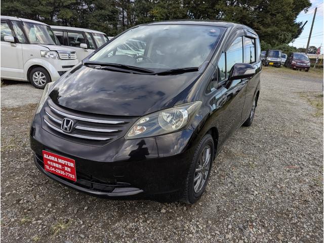 フリード Ｇ　ジャストセレクション　バックカメラ　フルセグテレビ　アルミホイール　キーレスエントリー　左側パワースライドドア　ＨＩＤ　ＥＴＣ　ＡＢＳ（3枚目）