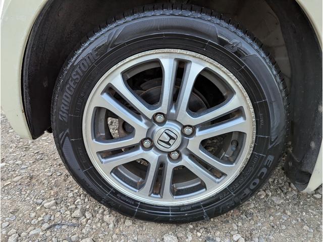 N-BOX G・Lパッケージ ワンオーナー 禁煙車 2023年製タイヤ 記録簿 バックカメラ BLUETOOTH 両側パワースライドドア プッシュスタートスマートキー ナビ テレビ アルミホイール ETC(14枚目)