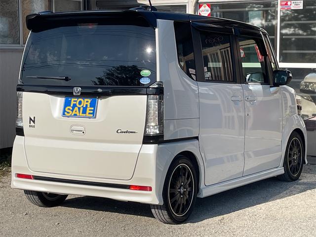 N-BOXカスタム 2トーンカラースタイル G・ターボLパッケージ 衝突軽減ブレーキ 両側パワースライド バックカメラ 純正ナビ フルセグTV オートクルーズ LEDフォグ ダウンサス 純正15AW パドルシフト 革巻きステアリング カーテン・サイドエアバック(49枚目)